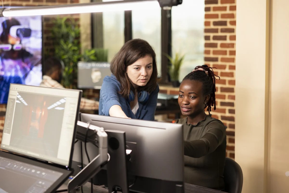 Women analyzing creative projects