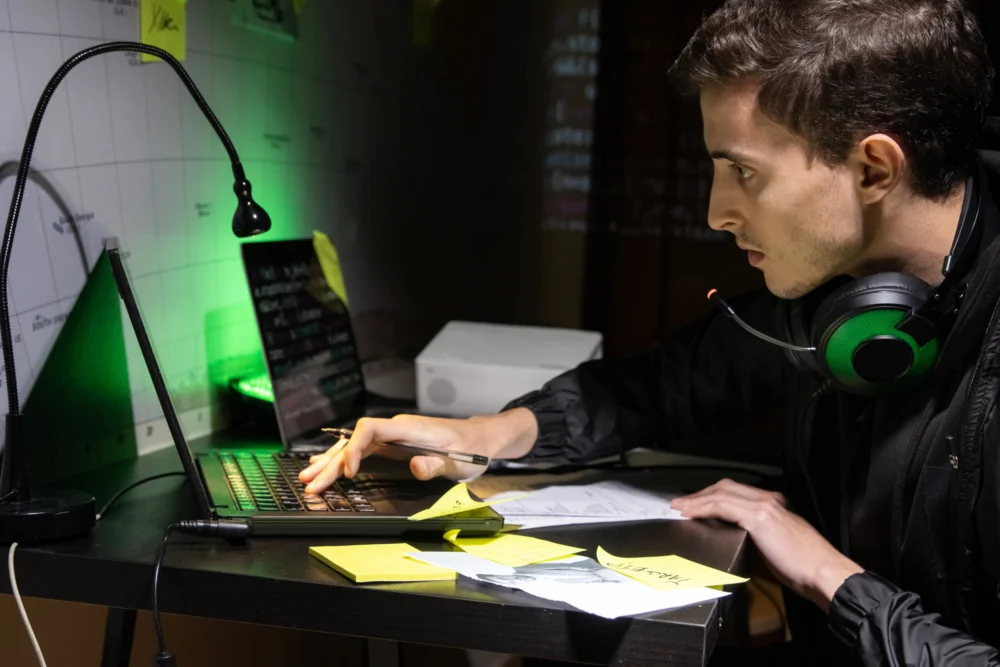 Young man planning hacker attack