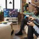 Diverse men bonding through video games at home