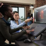 Digital interactive entertainment industry workers working with CGI.