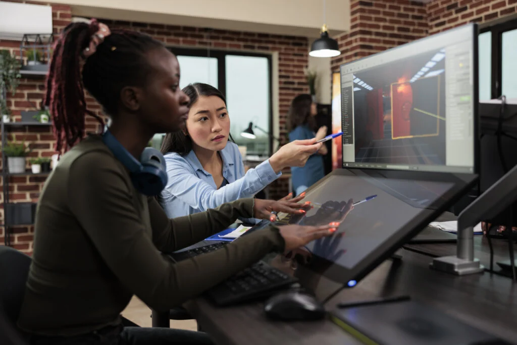 Digital interactive entertainment industry workers working with CGI.
