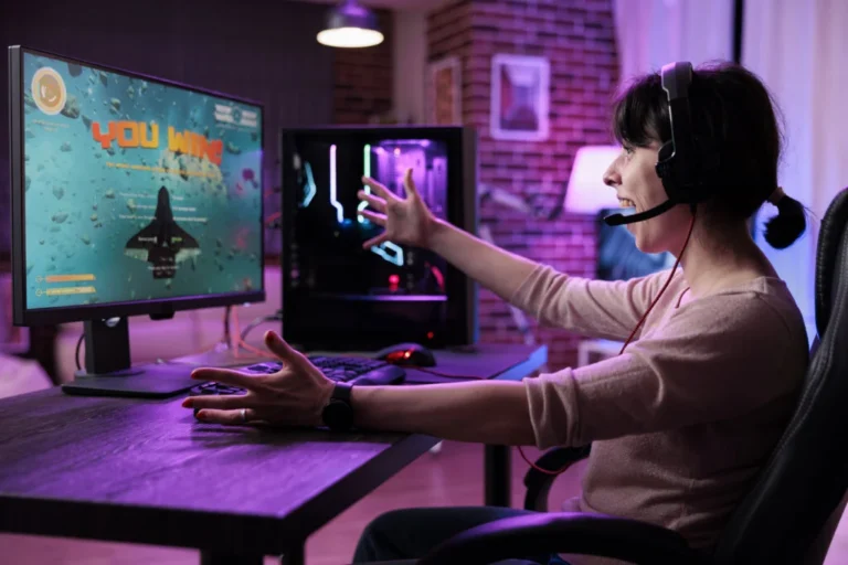 Young gamer celebrating video games championship win